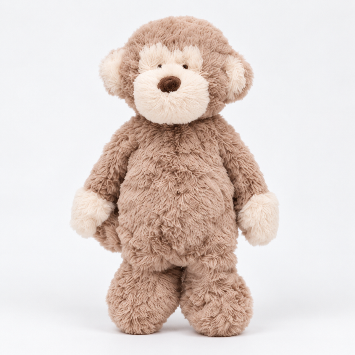 Felix plush monkey standing front view with taupe-brown fur and cream face and hands against white background