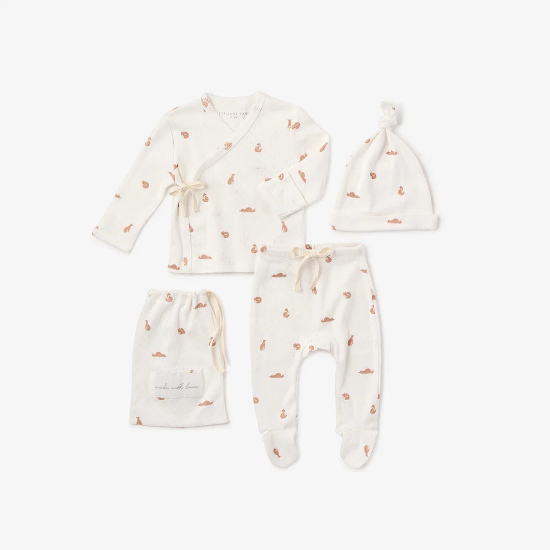 Fox-print organic cotton newborn layette set with kimono top, footed pants, knotted beanie and drawstring bag