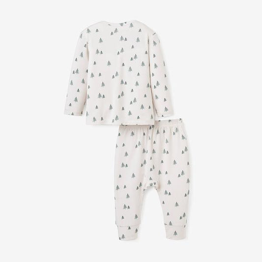 Cream color bamboo baby pajama set with long-sleeve lap-shoulder top and pull-on pants with green christmas tree print all over back view on white background