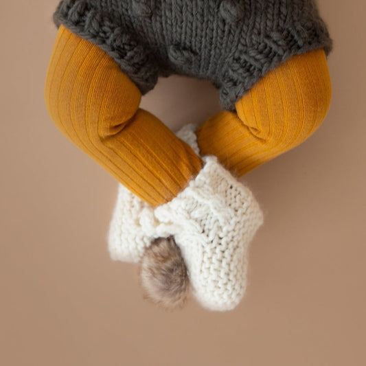 Cream Booties with Faux Fur Pom