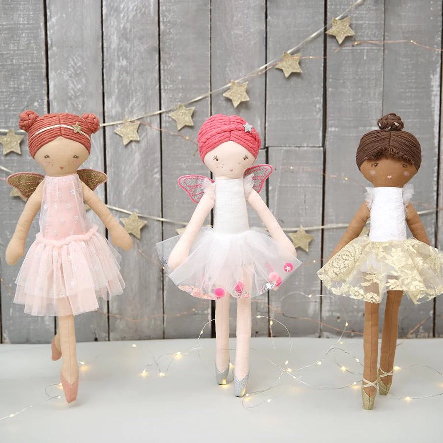 Handmade fairy dolls displayed together for nursery décor and gifting