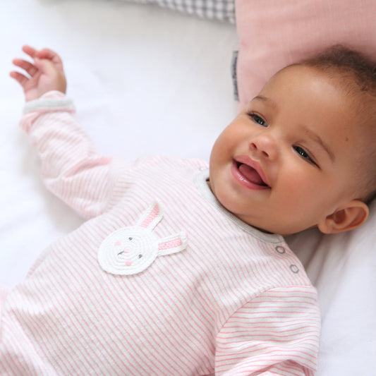 Organic cotton baby romper with bunny detail and long sleeves
