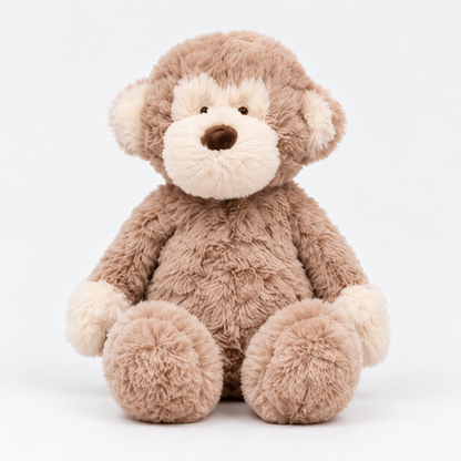 Felix plush monkey sitting front view with taupe-brown fur and cream face and hands against white background