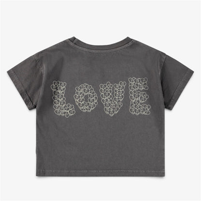 Girls’ gray organic cotton cropped T-shirt with  Love graphic on back pictured on white background