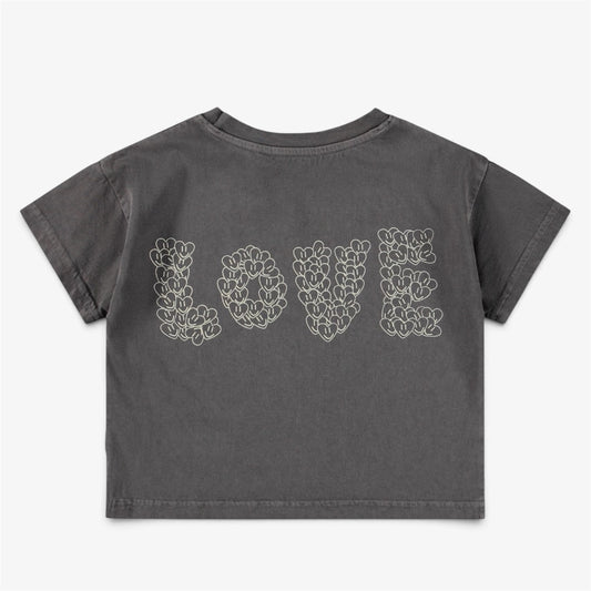 Girls’ gray organic cotton cropped T-shirt with  Love graphic on back pictured on white background