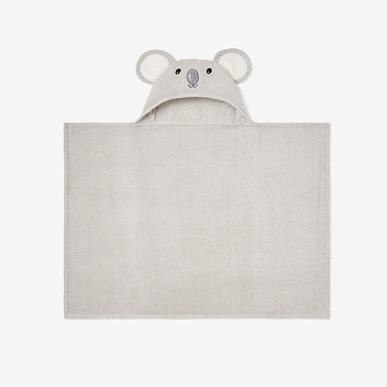 A light gray baby blanket with an attached hood shaped like a koala head, featuring embroidered eyes, nose, and ears, shown on a plain white background.