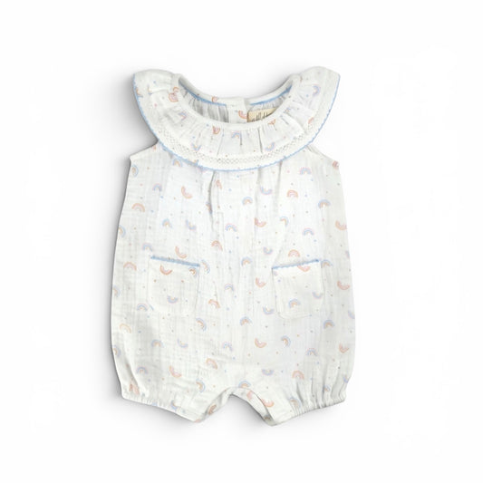 Mini rainbow baby romper made from organic cotton with ruffle collar and lace trim