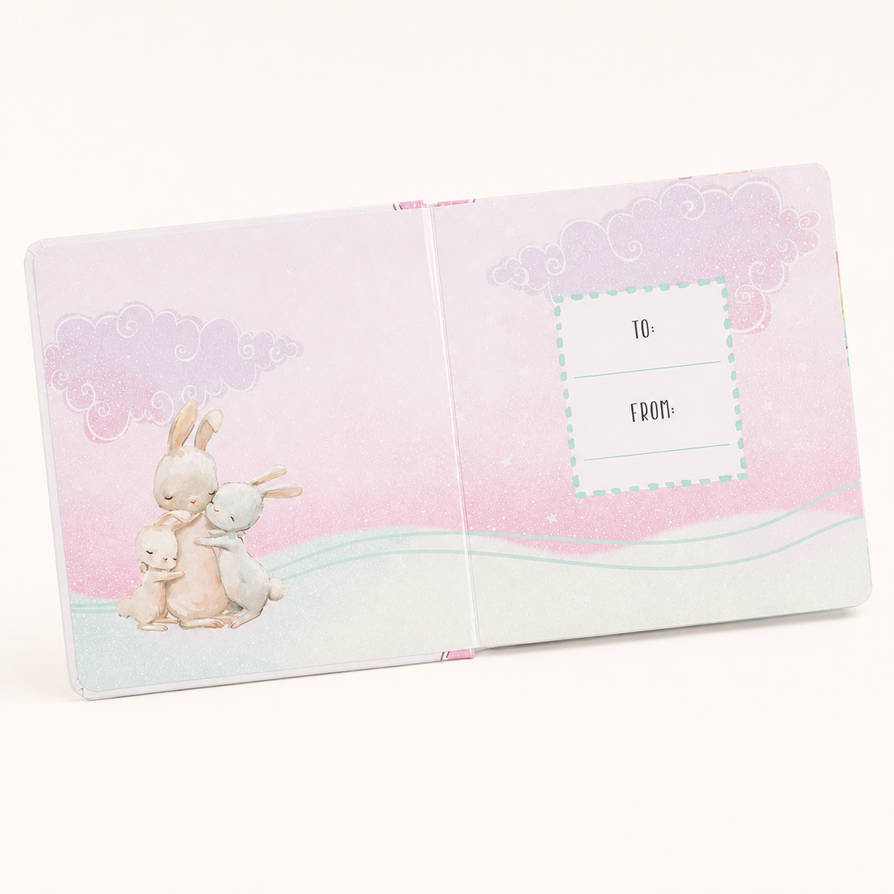 Open My LullaBible for Girls personalization page with To and From fields, a pastel pink background, and three illustrated rabbits
