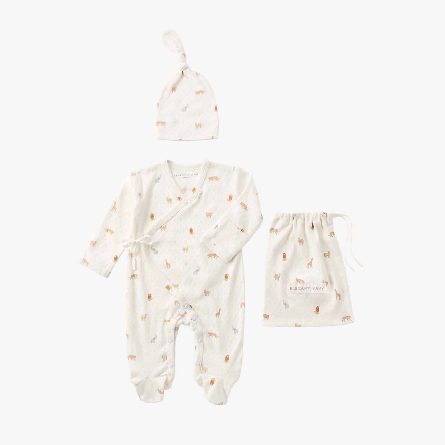 Baby clothing set with romper, hat, and bag on a white background