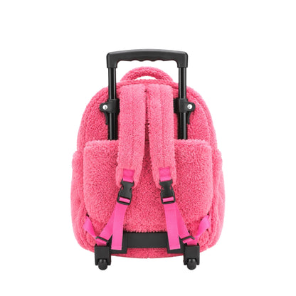 Back view of pink plush kids rolling backpack showing adjustable shoulder straps, black retractable handle, trolley frame, and wheels on a white background.