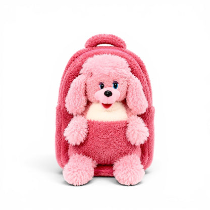 Pink plush kids backpack with soft fuzzy texture, front pocket, top handle, and light pink stuffed puppy design on a white background.