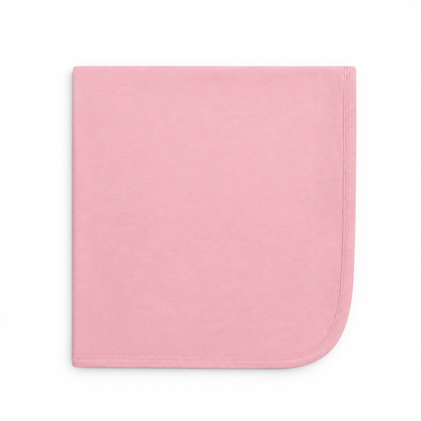 Soft blush pink baby blanket with rounded corner and stitched trim.
