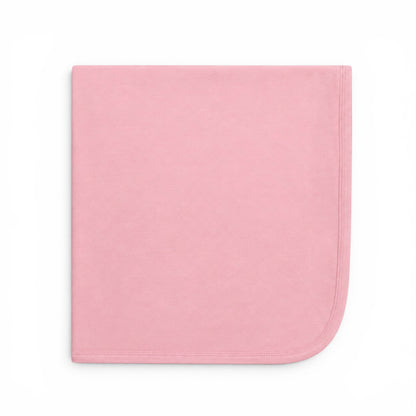 Soft blush pink baby blanket with rounded corner and stitched trim.