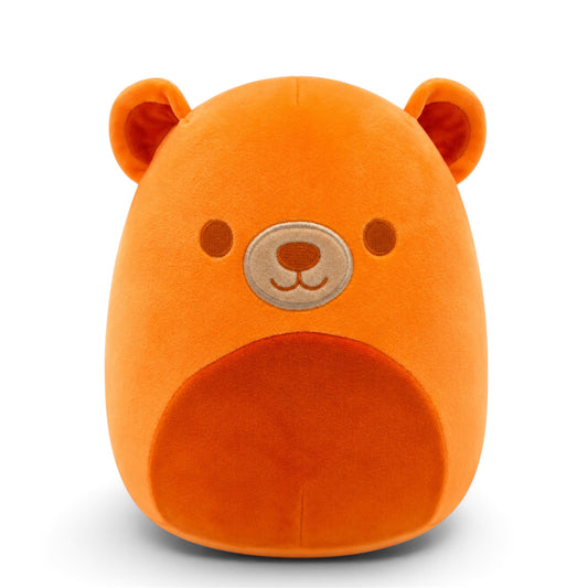 An orange plush bear head pillow with embroidered facial features, photographed against a clean white background.