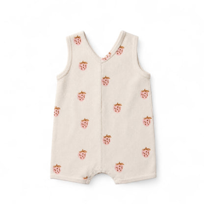 Cream baby romper with pink strawberry print and sleeveless design.