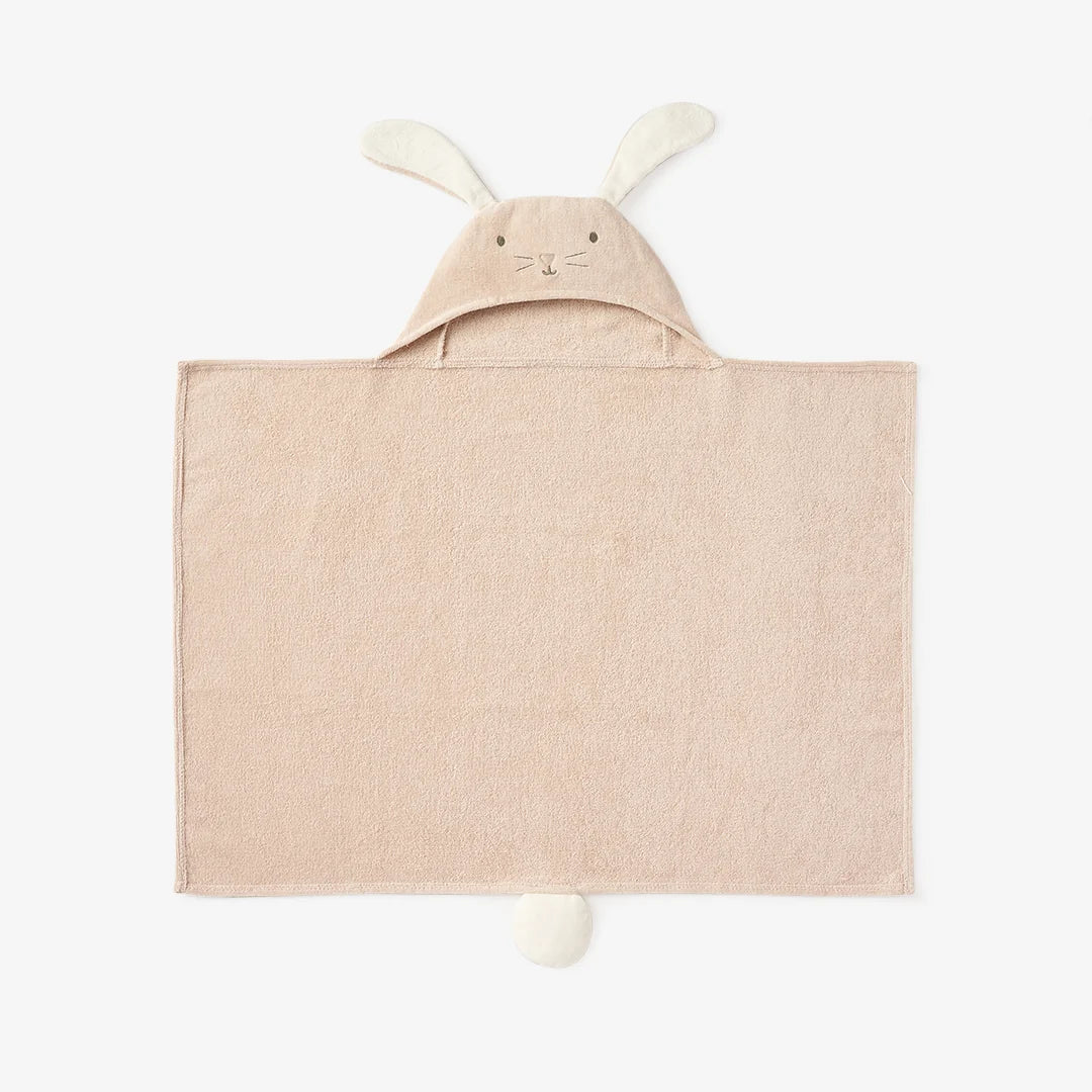 Beige hooded towel with bunny ears and tail on a white background