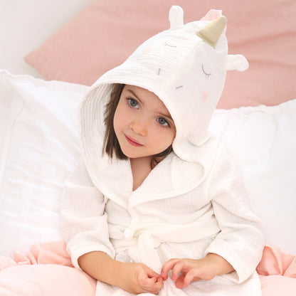 Child wearing Unicorn Organic Cotton Robe during bath time and lounging