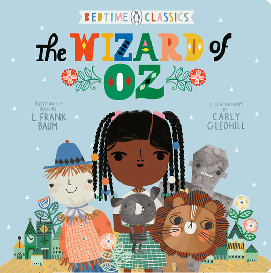 Cover of a children's board book titled 'The Wizard of Oz', featuring colorful illustrations of characters from the Oz series including Dorothy, the Scarecrow, the Tin Woodsman, and the Cowardly Lion.